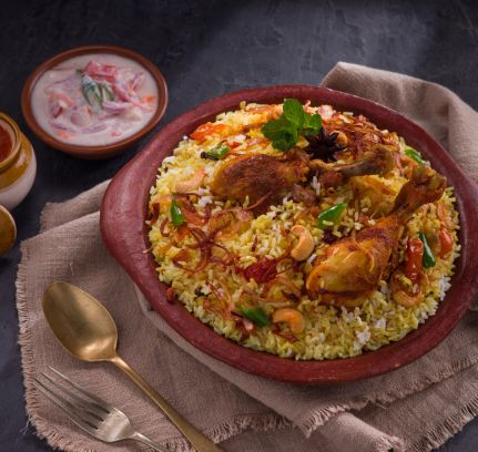 Chicken Biriyani served with Raitha 