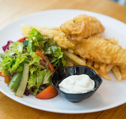 Chicken kiev served with chips and salad or garden veg 