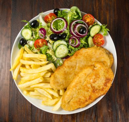Chicken shnitzel served with veg or chips and salad 